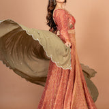 Rust Orange and Green Tissue Silk Lehenga Set With Hand Embroidered Resham Work Side
