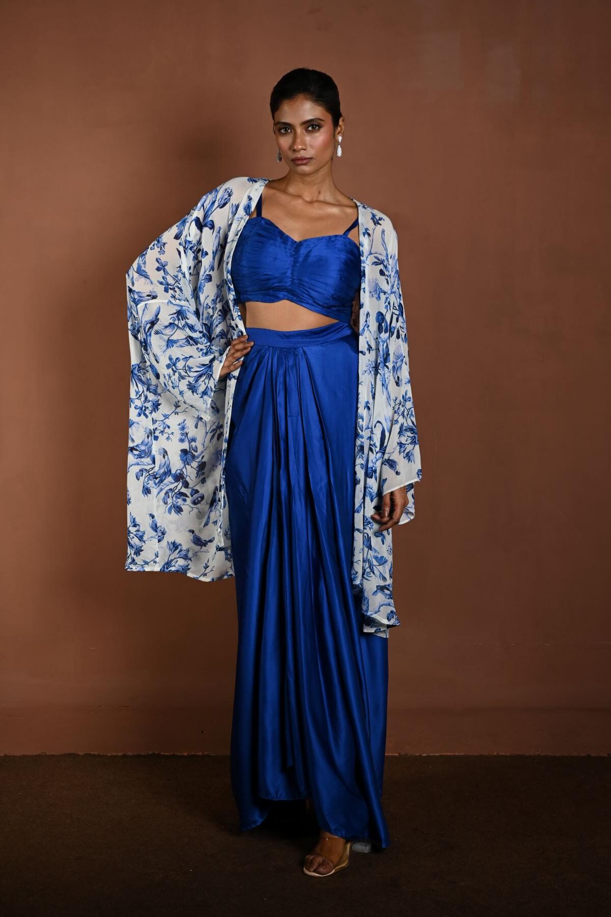 Blue Draped Skirt Set with Matching Blouse and White Cape Jacket - Anvi Couture