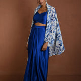 Blue Draped Skirt Set with Matching Blouse and White Cape Jacket - Anvi Couture