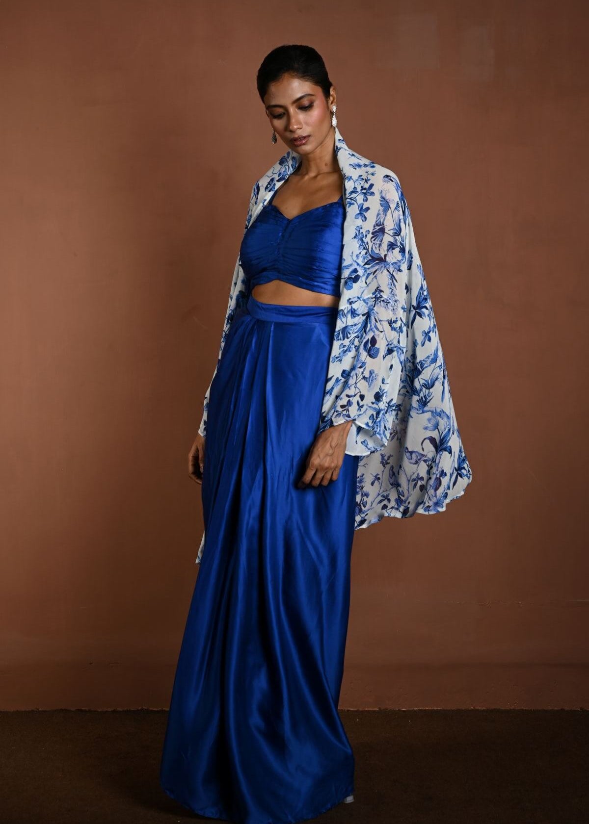 Blue Draped Skirt Set with Matching Blouse and White Cape Jacket - Anvi Couture