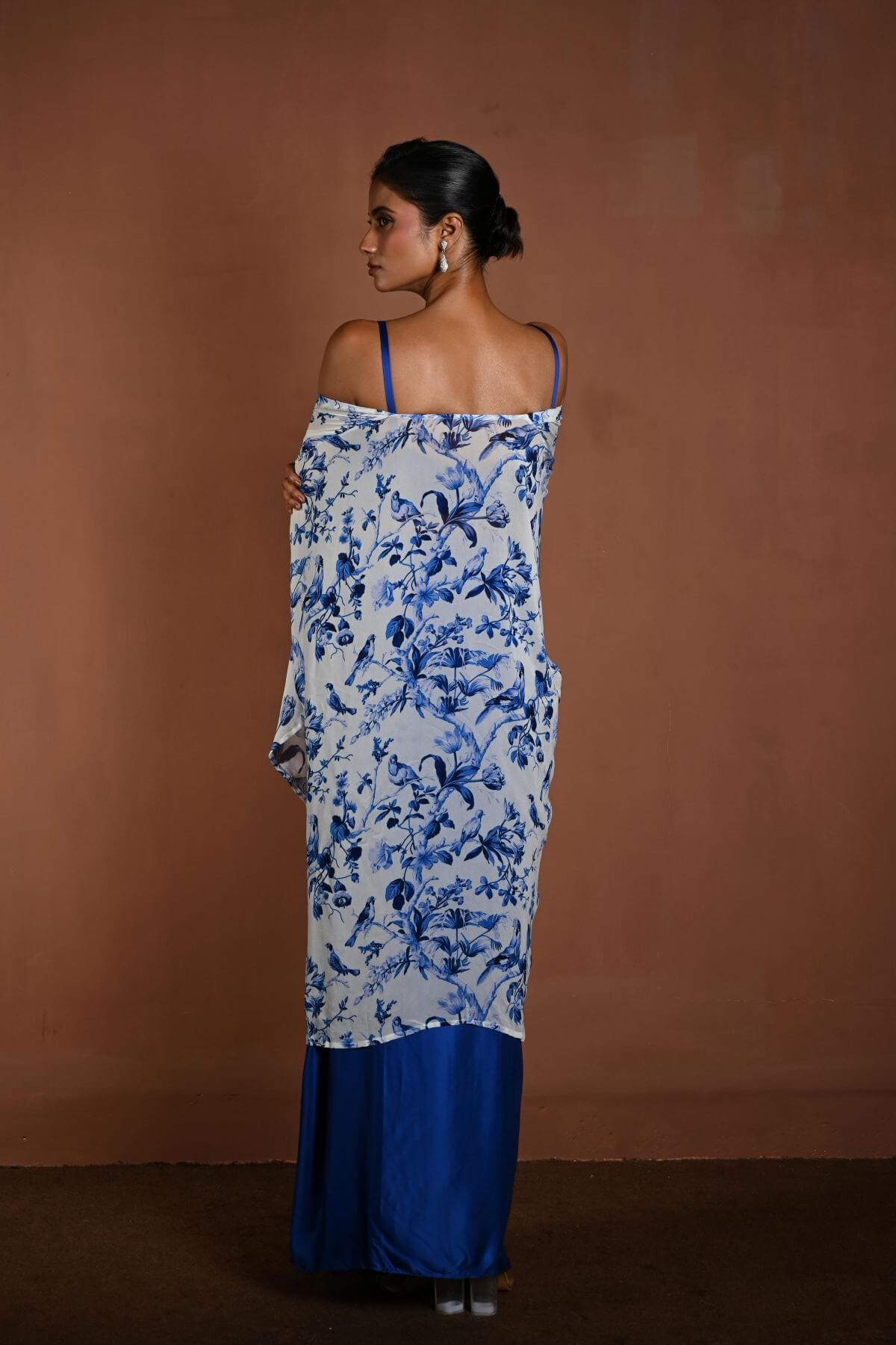 Blue Draped Skirt Set with Matching Blouse and White Cape Jacket - Anvi Couture