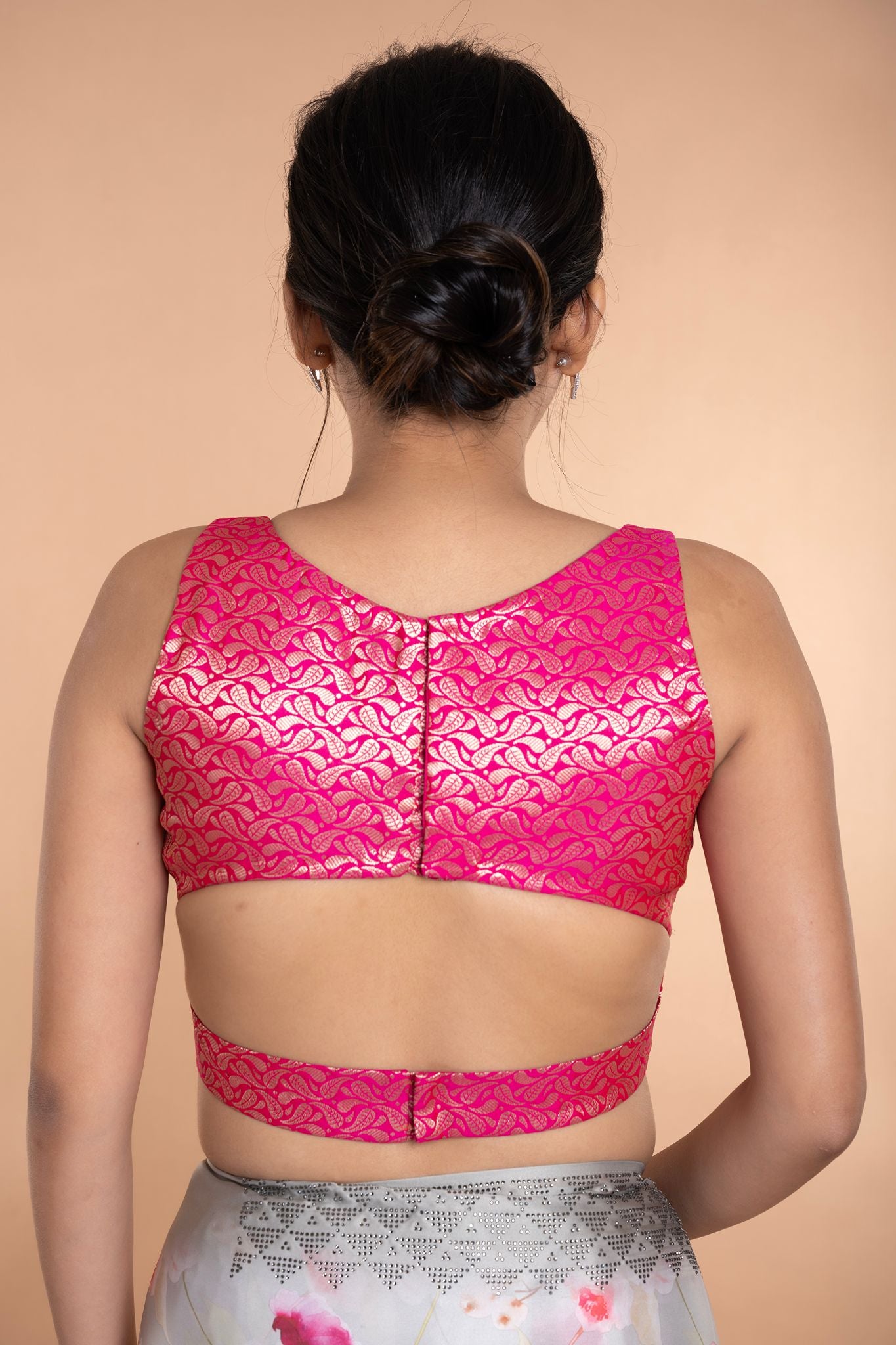 Fusia Pink Brocade Sleeveless Blouse with Curved V Neckline and Back Cutout - Anvi Couture