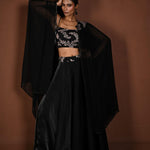 Black Lehenga Set with Embroidered Choli and Cape Sleeves - Anvi Couture