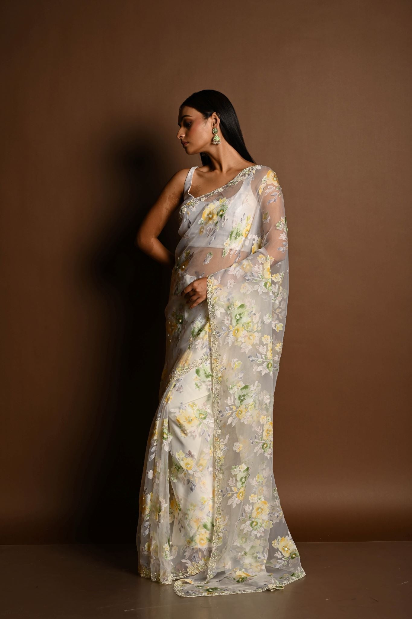 White Net Saree with Multicolored Floral Embroidery and Cutdana Border - Anvi Couture