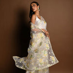 White Net Saree with Multicolored Floral Embroidery and Cutdana Border - Anvi Couture