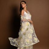 White Net Saree with Multicolored Floral Embroidery and Cutdana Border - Anvi Couture