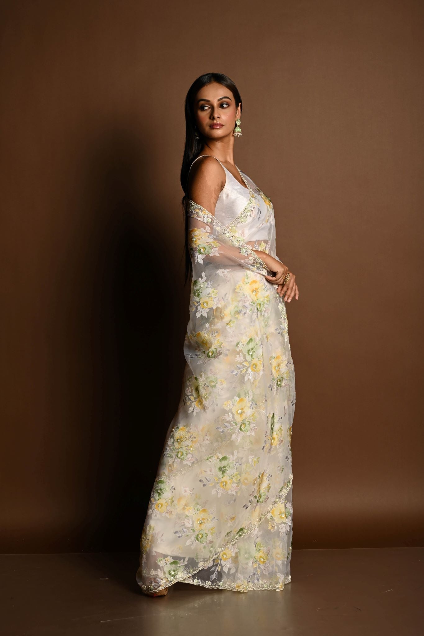 White Net Saree with Multicolored Floral Embroidery and Cutdana Border - Anvi Couture