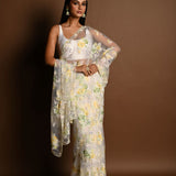 White Net Saree with Multicolored Floral Embroidery and Cutdana Border - Anvi Couture