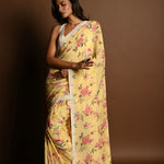 Butter Yellow Georgette Saree with Floral Prints and Pearl Embroidery Border - Anvi Couture