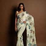 Mint Green Chiffon Saree with White, Blue and Copper Floral Sequin Work - Anvi Couture