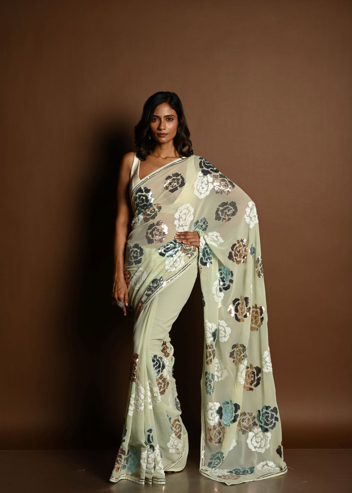 Mint Green Chiffon Saree with White, Blue and Copper Floral Sequin Work - Anvi Couture