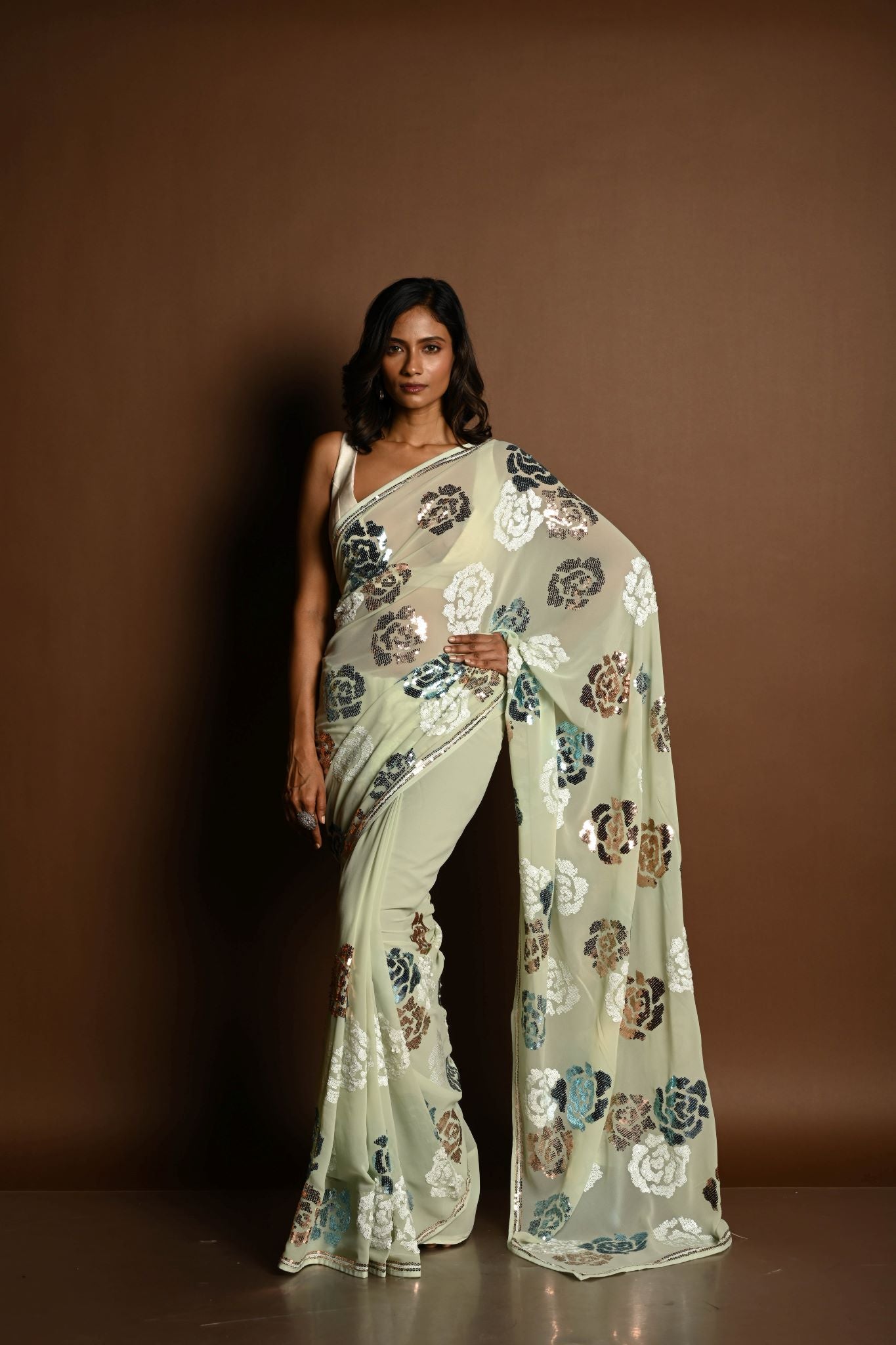 Mint Green Chiffon Saree with White, Blue and Copper Floral Sequin Work - Anvi Couture