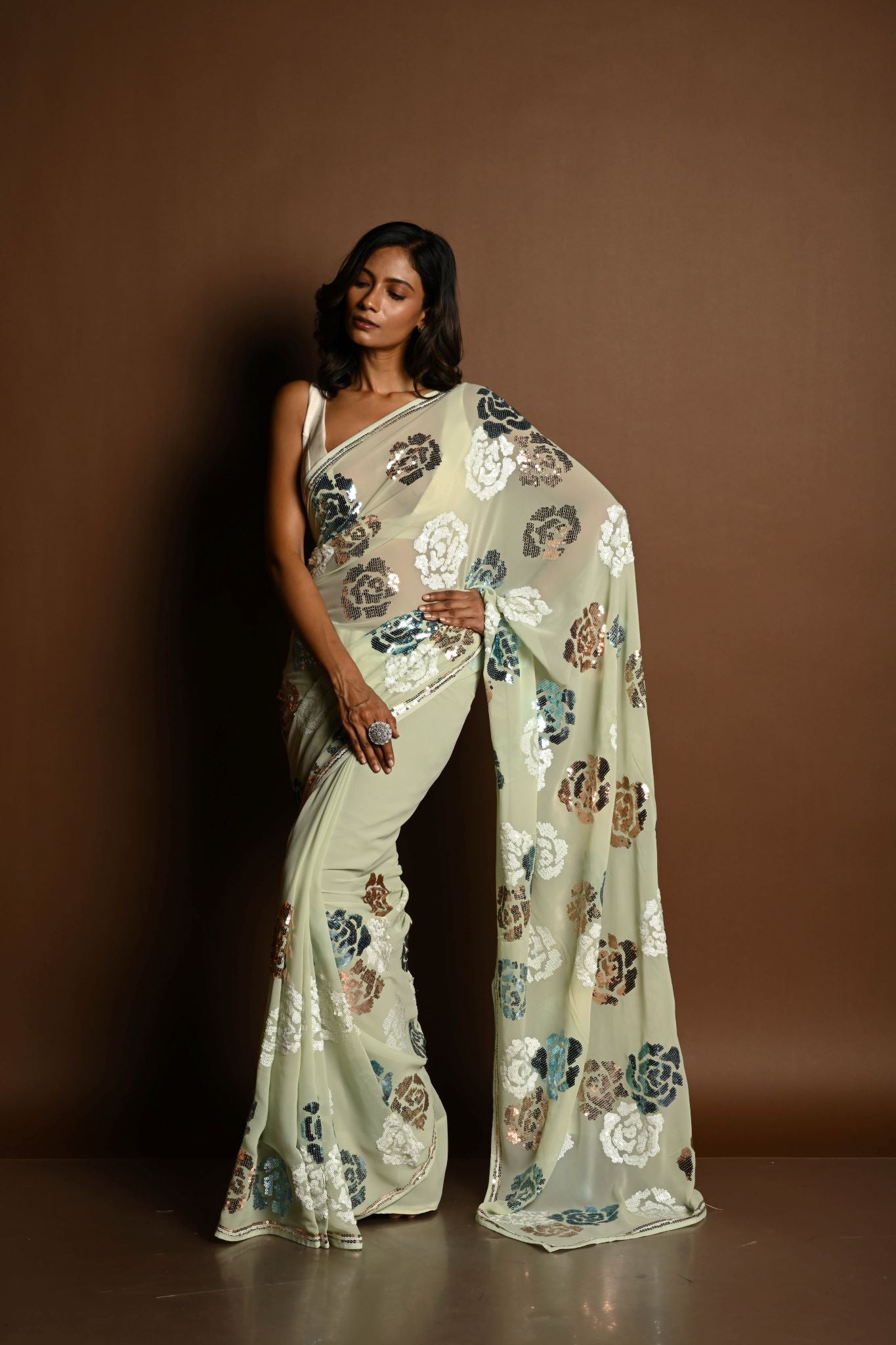 Mint Green Chiffon Saree with White, Blue and Copper Floral Sequin Work - Anvi Couture