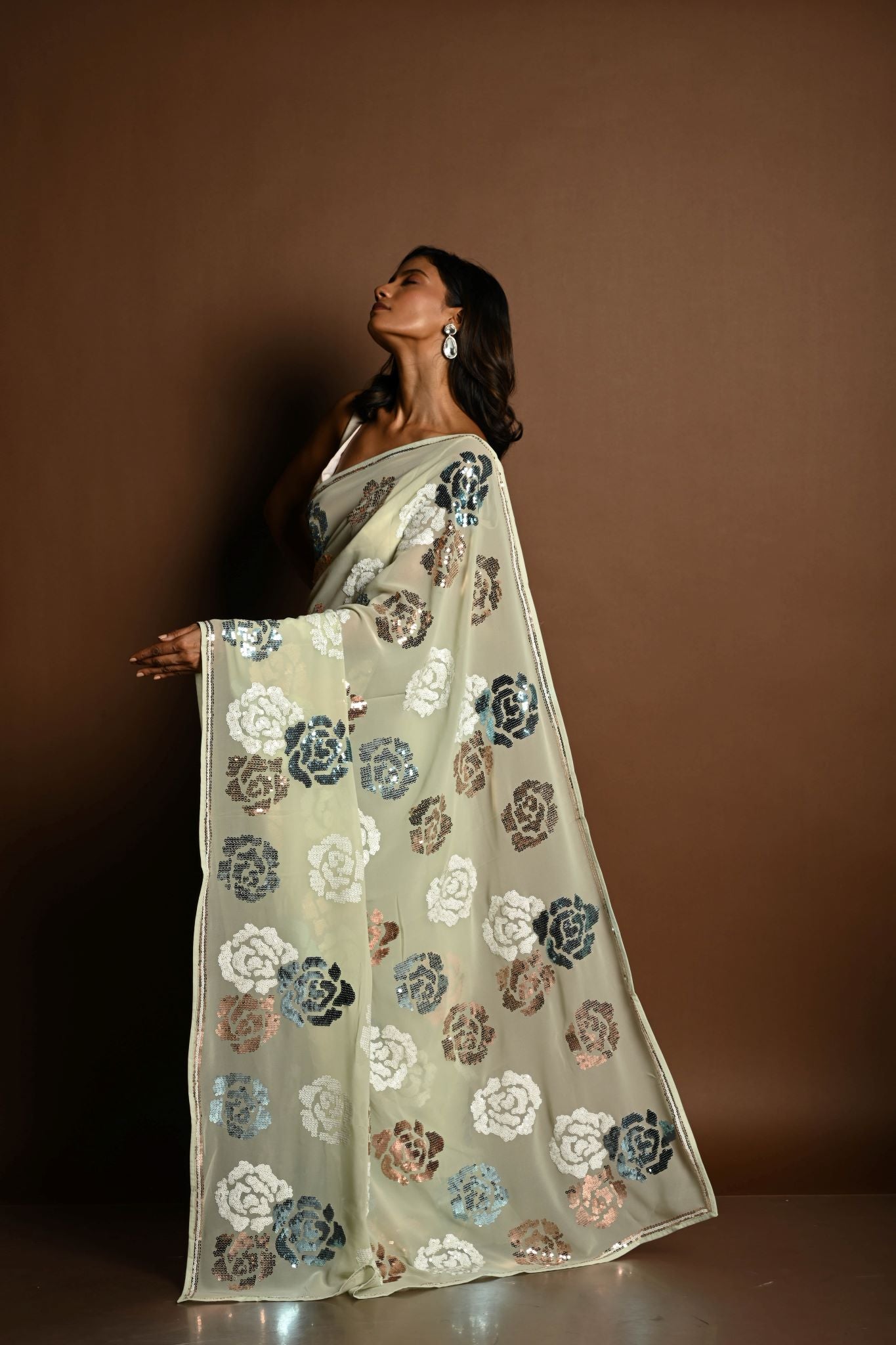 Mint Green Chiffon Saree with White, Blue and Copper Floral Sequin Work - Anvi Couture