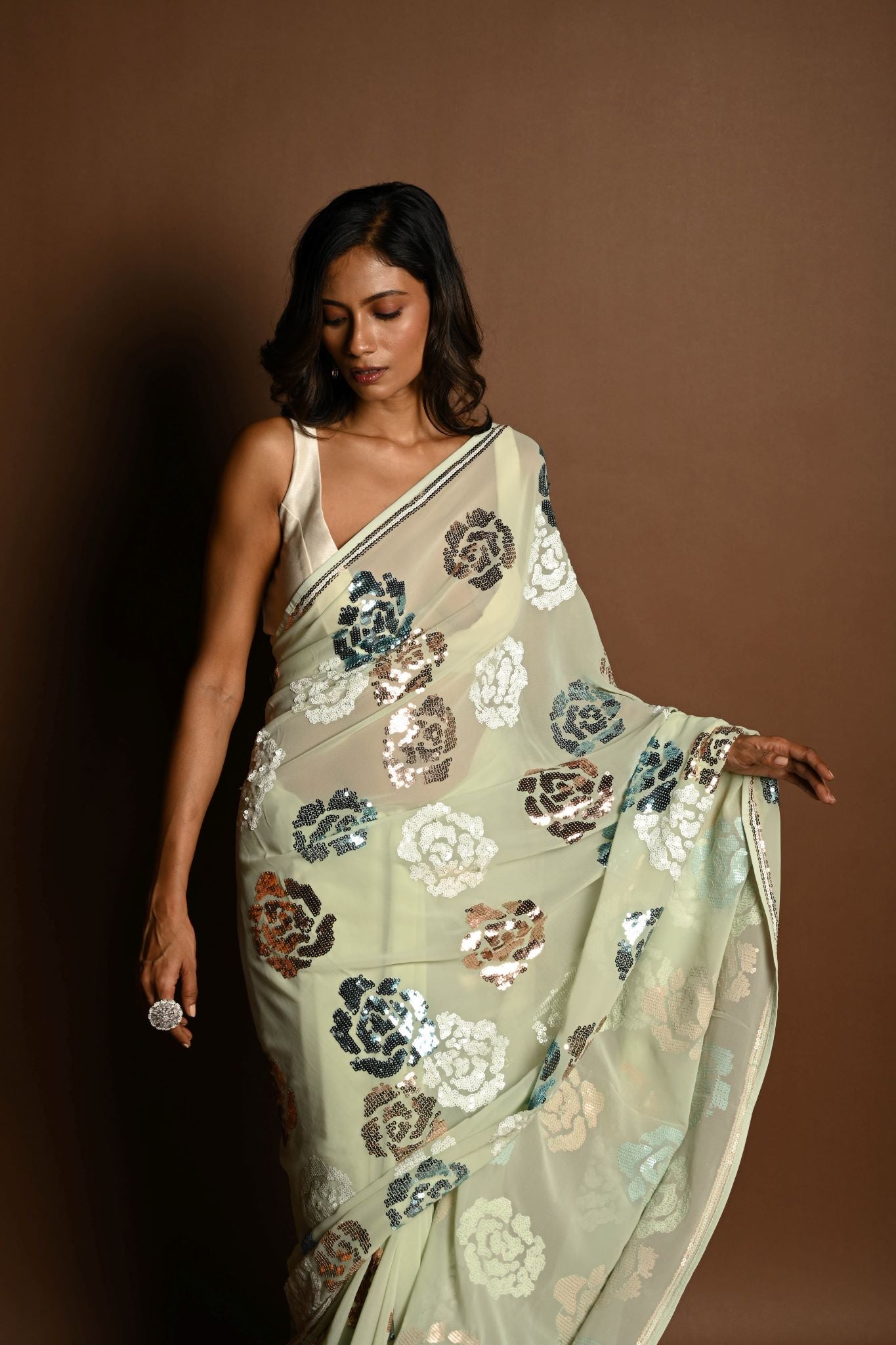 Mint Green Chiffon Saree with White, Blue and Copper Floral Sequin Work - Anvi Couture