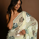 Mint Green Chiffon Saree with White, Blue and Copper Floral Sequin Work - Anvi Couture