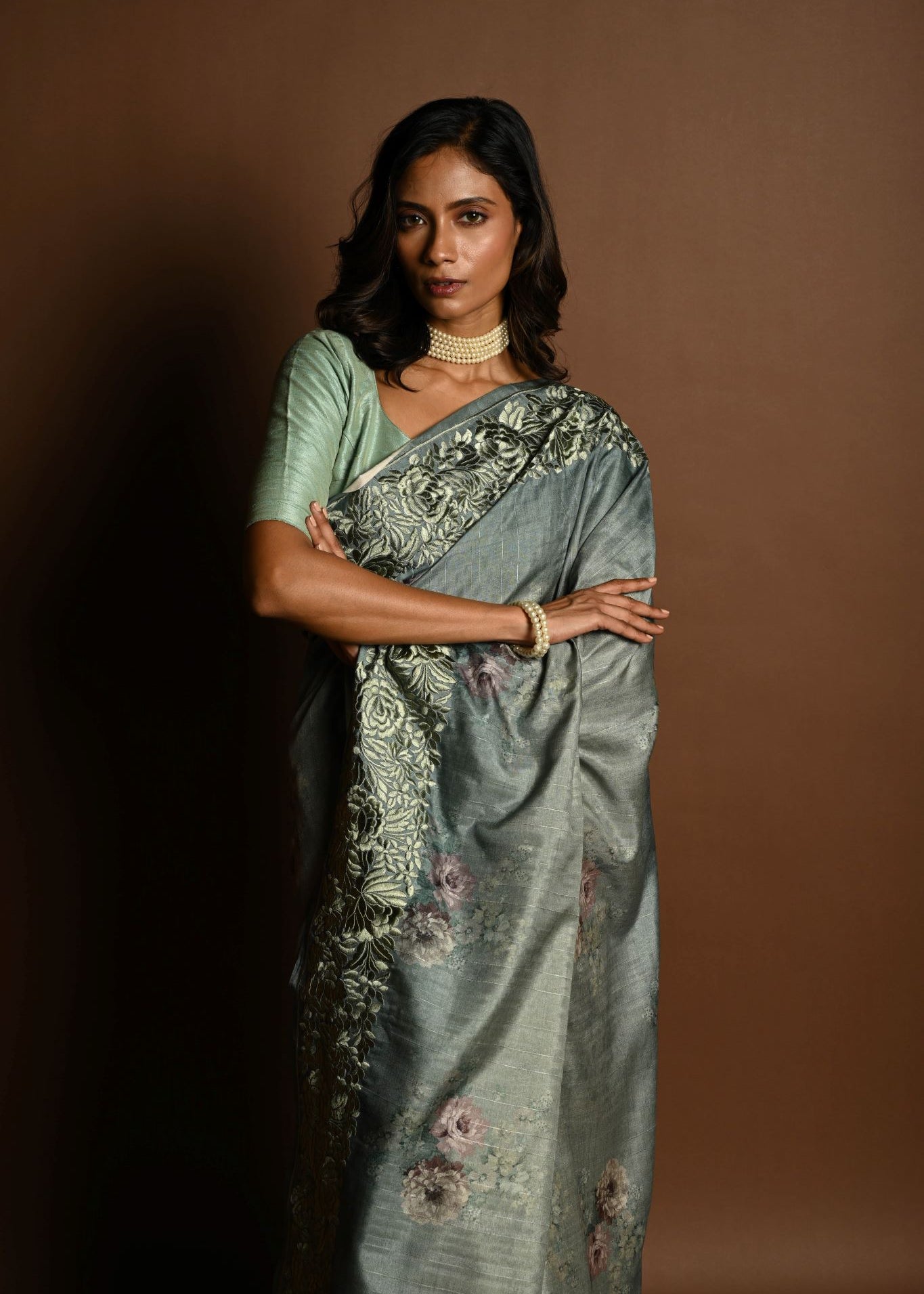 Sage Green Satin Silk Saree with Floral Prints and Parsi Gara Border - Anvi Couture