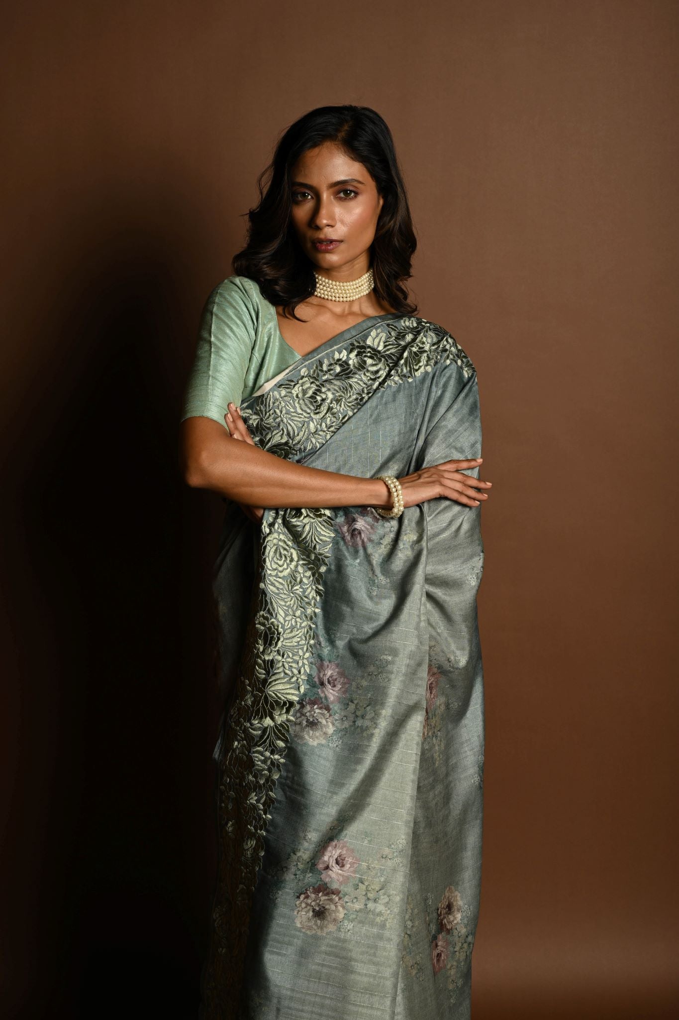 Sage Green Satin Silk Saree with Floral Prints and Parsi Gara Border - Anvi Couture