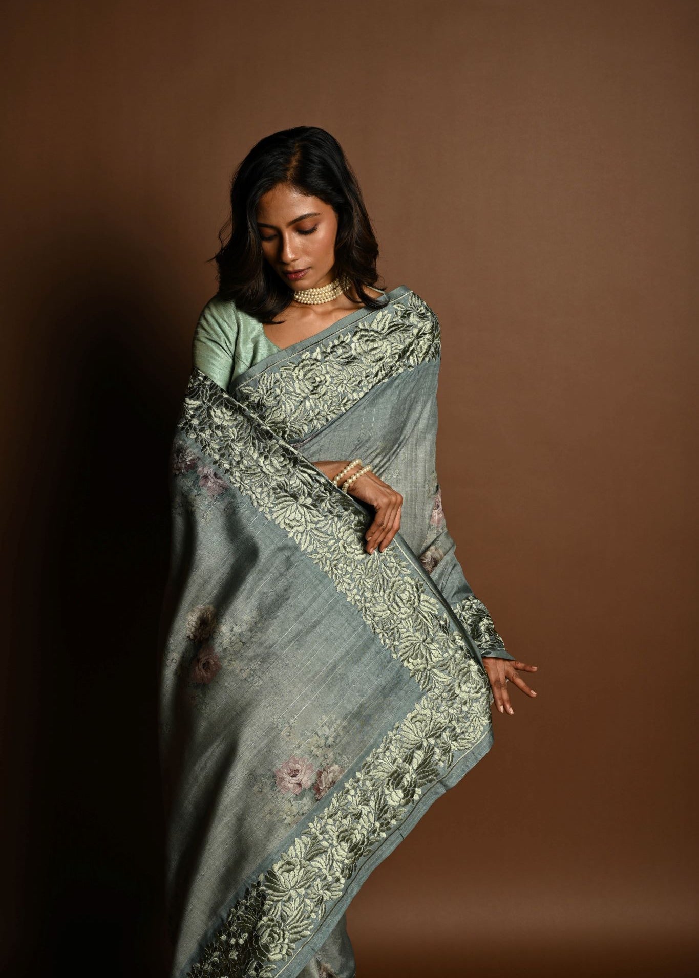 Sage Green Satin Silk Saree with Floral Prints and Parsi Gara Border - Anvi Couture