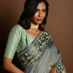 Sage Green Satin Silk Saree with Floral Prints and Parsi Gara Border - Anvi Couture