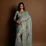 Sage Green Satin Silk Saree with Floral Prints and Parsi Gara Border - Anvi Couture