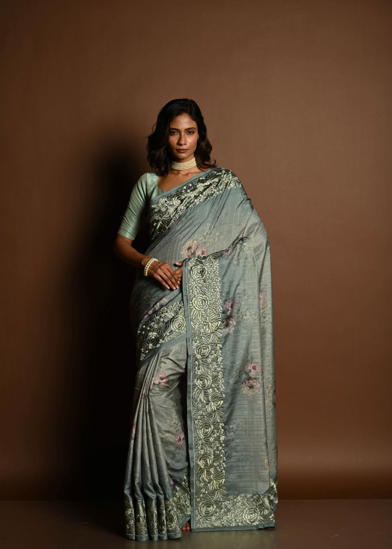 Sage Green Satin Silk Saree with Floral Prints and Parsi Gara Border - Anvi Couture