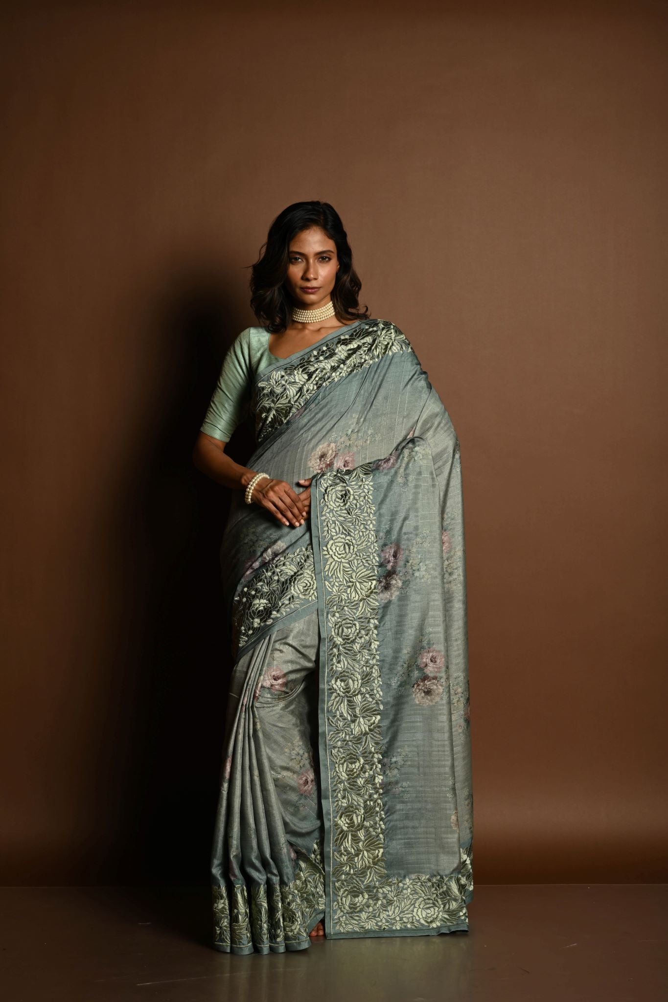 Sage Green Satin Silk Saree with Floral Prints and Parsi Gara Border - Anvi Couture