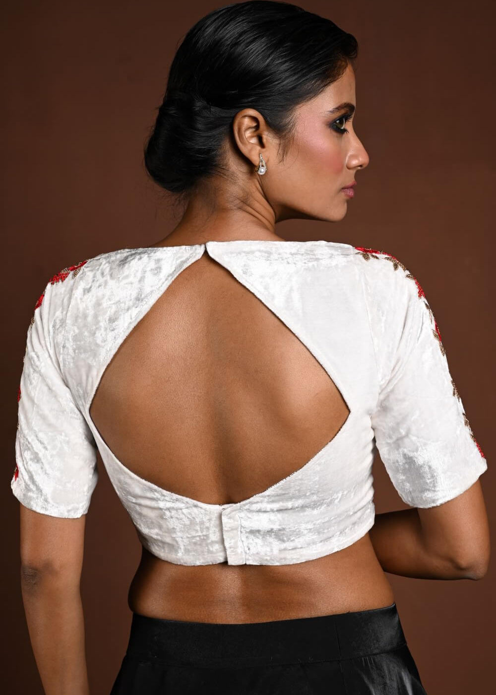 White Half Sleeve Blouse with Hand Embroidery Work in Velvet and Back Cutout - Anvi Couture