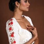White Half Sleeve Blouse with Hand Embroidery Work in Velvet and Back Cutout - Anvi Couture