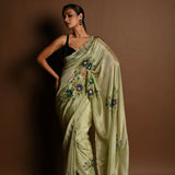 Olive Green Crepe Silk Saree with Floral Prints and Embroidered stonework and Cutdana Border - Anvi Couture