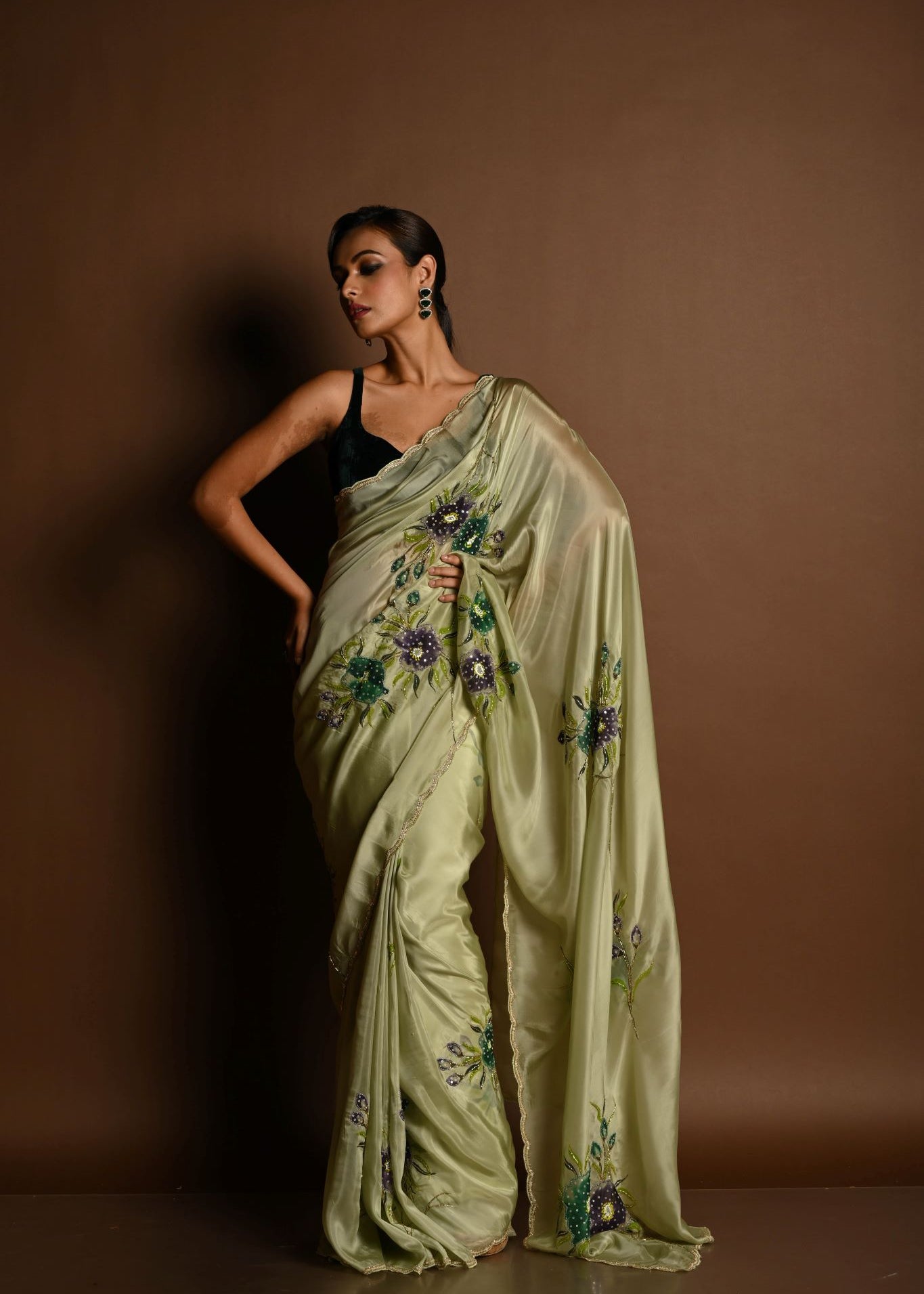 Olive Green Crepe Silk Saree with Floral Prints and Embroidered stonework and Cutdana Border - Anvi Couture