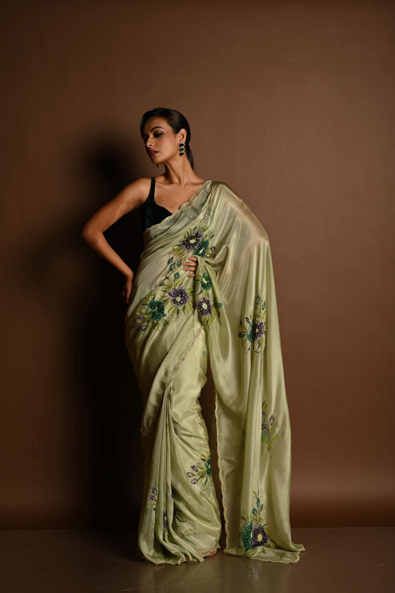 Olive Green Crepe Silk Saree with Floral Prints and Embroidered stonework and Cutdana Border - Anvi Couture