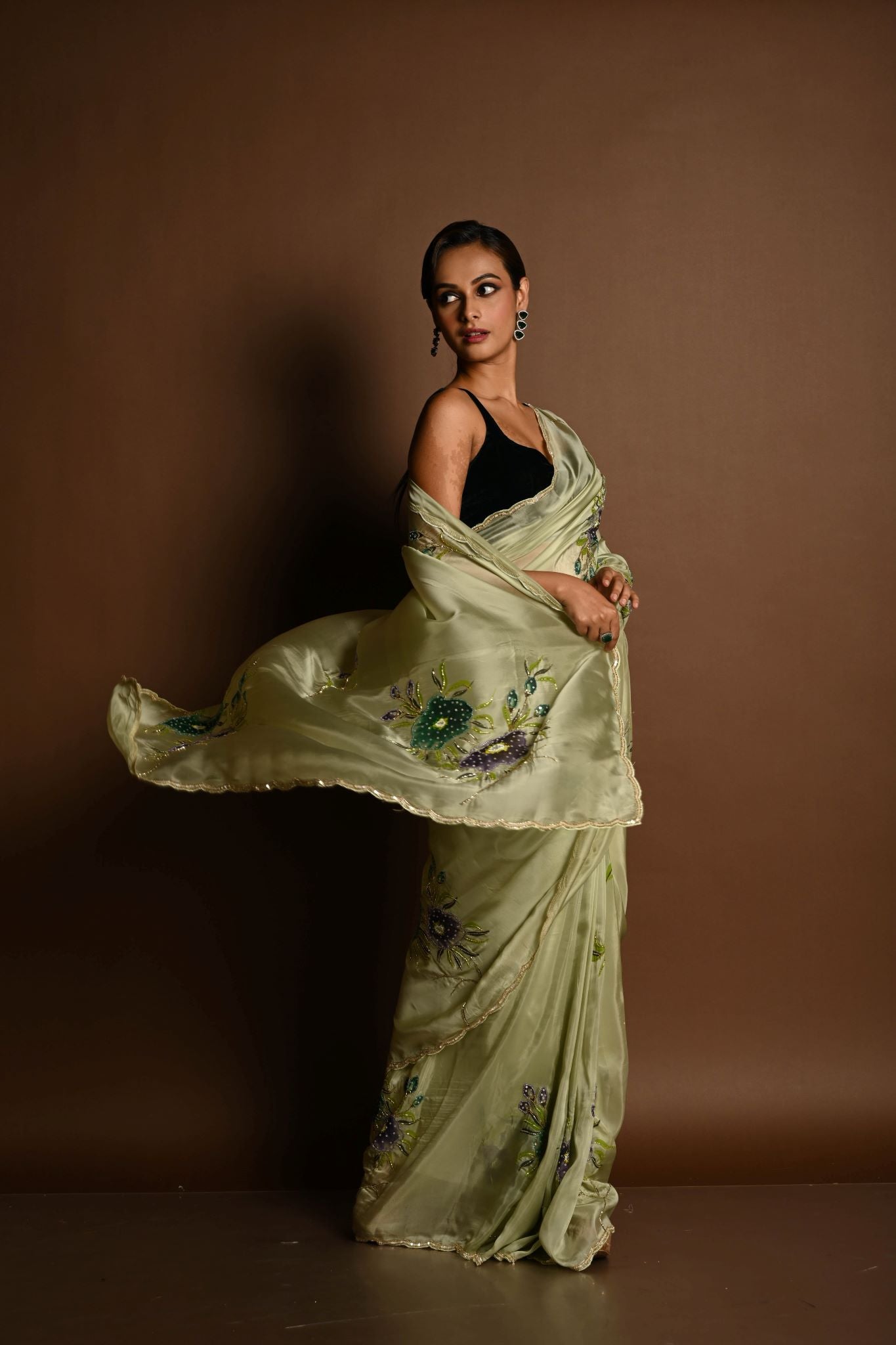 Olive Green Crepe Silk Saree with Floral Prints and Embroidered stonework and Cutdana Border - Anvi Couture