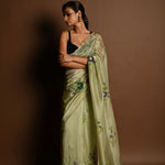 Olive Green Crepe Silk Saree with Floral Prints and Embroidered stonework and Cutdana Border - Anvi Couture