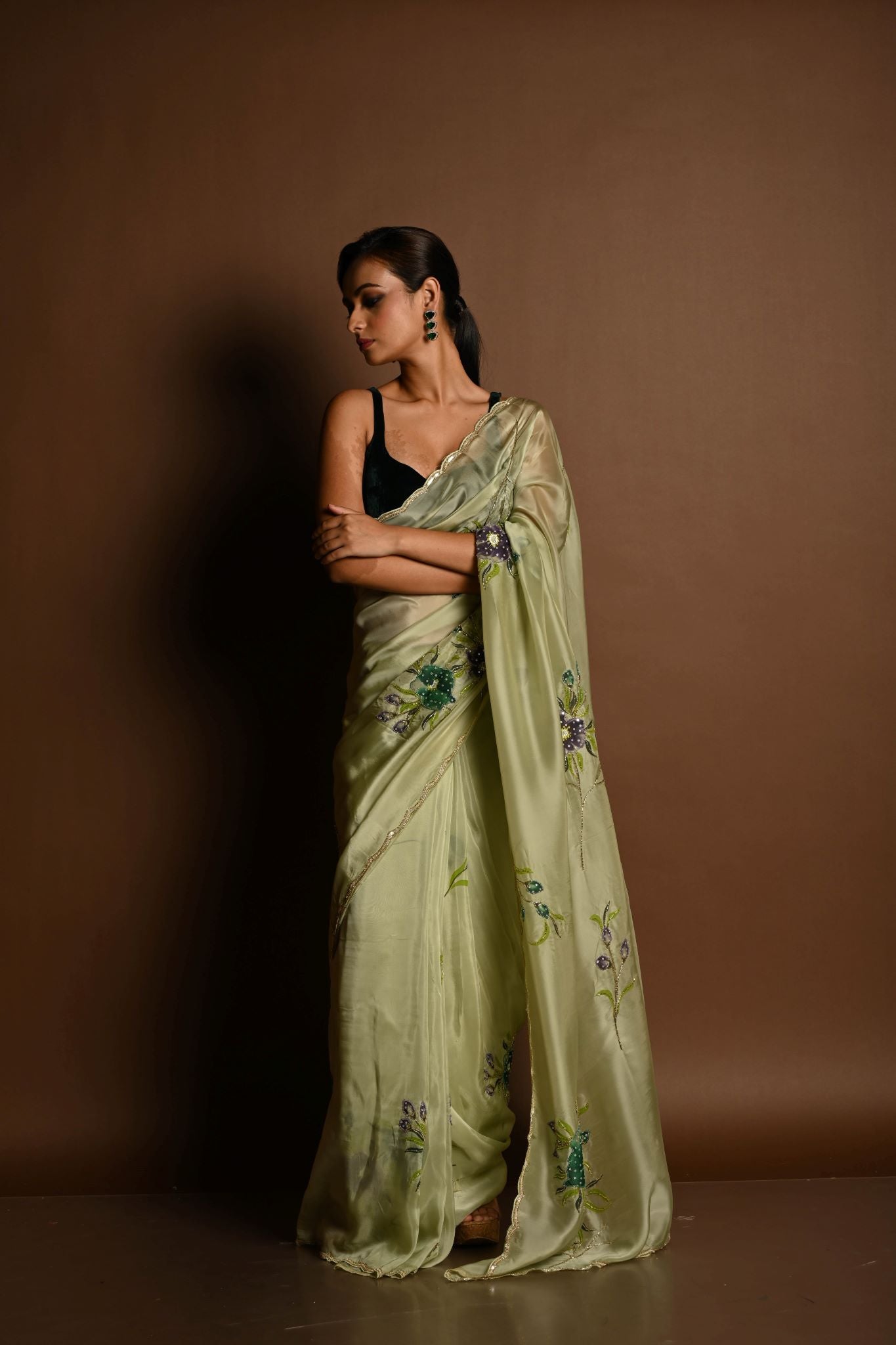 Olive Green Crepe Silk Saree with Floral Prints and Embroidered stonework and Cutdana Border - Anvi Couture