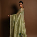 Olive Green Crepe Silk Saree with Floral Prints and Embroidered stonework and Cutdana Border - Anvi Couture