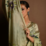 Olive Green Crepe Silk Saree with Floral Prints and Embroidered stonework and Cutdana Border - Anvi Couture