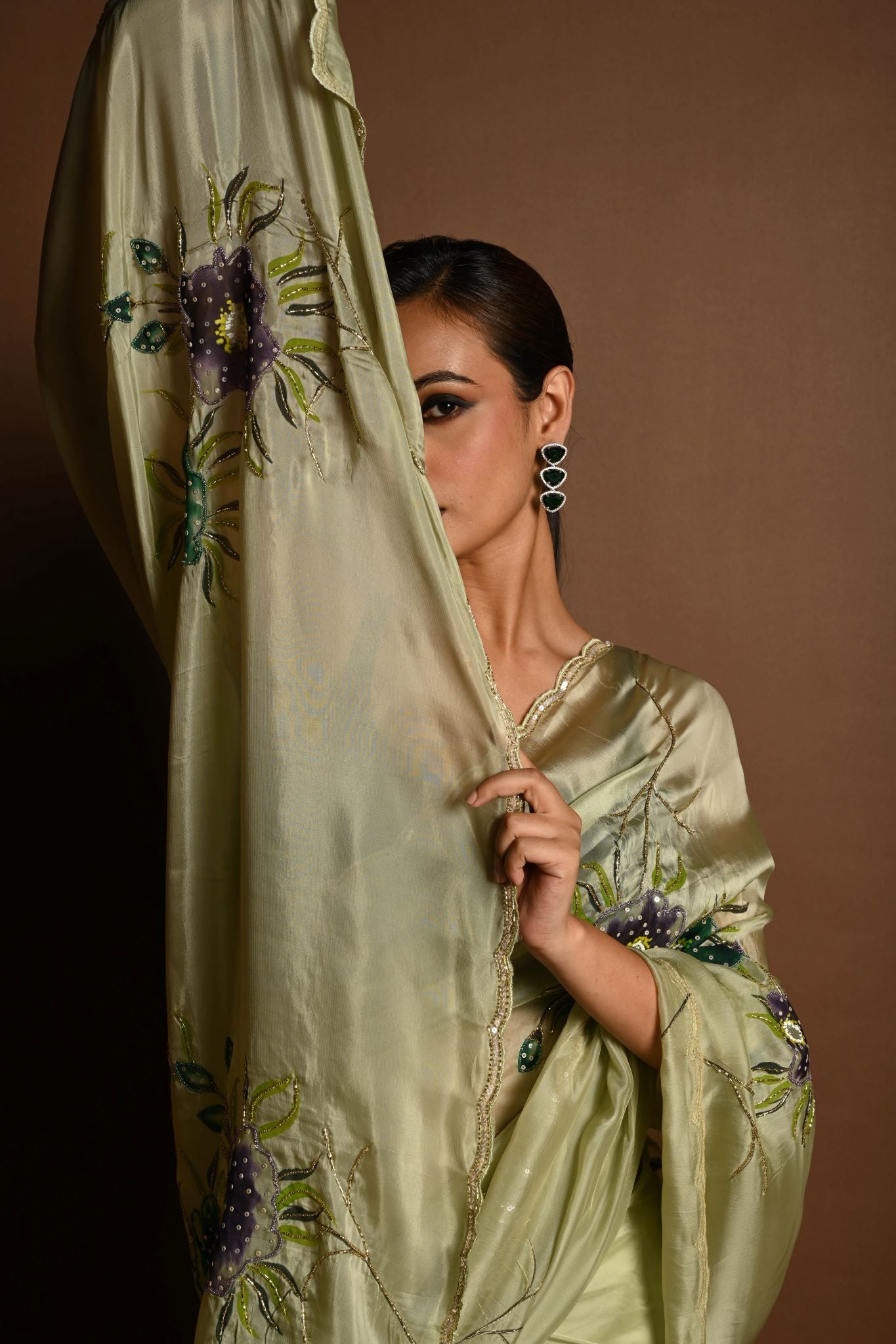 Olive Green Crepe Silk Saree with Floral Prints and Embroidered stonework and Cutdana Border - Anvi Couture