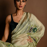 Olive Green Crepe Silk Saree with Floral Prints and Embroidered stonework and Cutdana Border - Anvi Couture