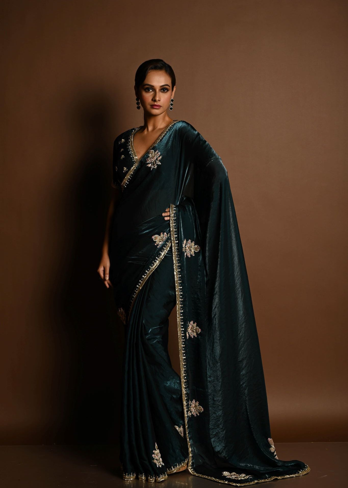 Dark Green Silk Organza Saree with a hand-embroidered finish and matching blouse - Image 1