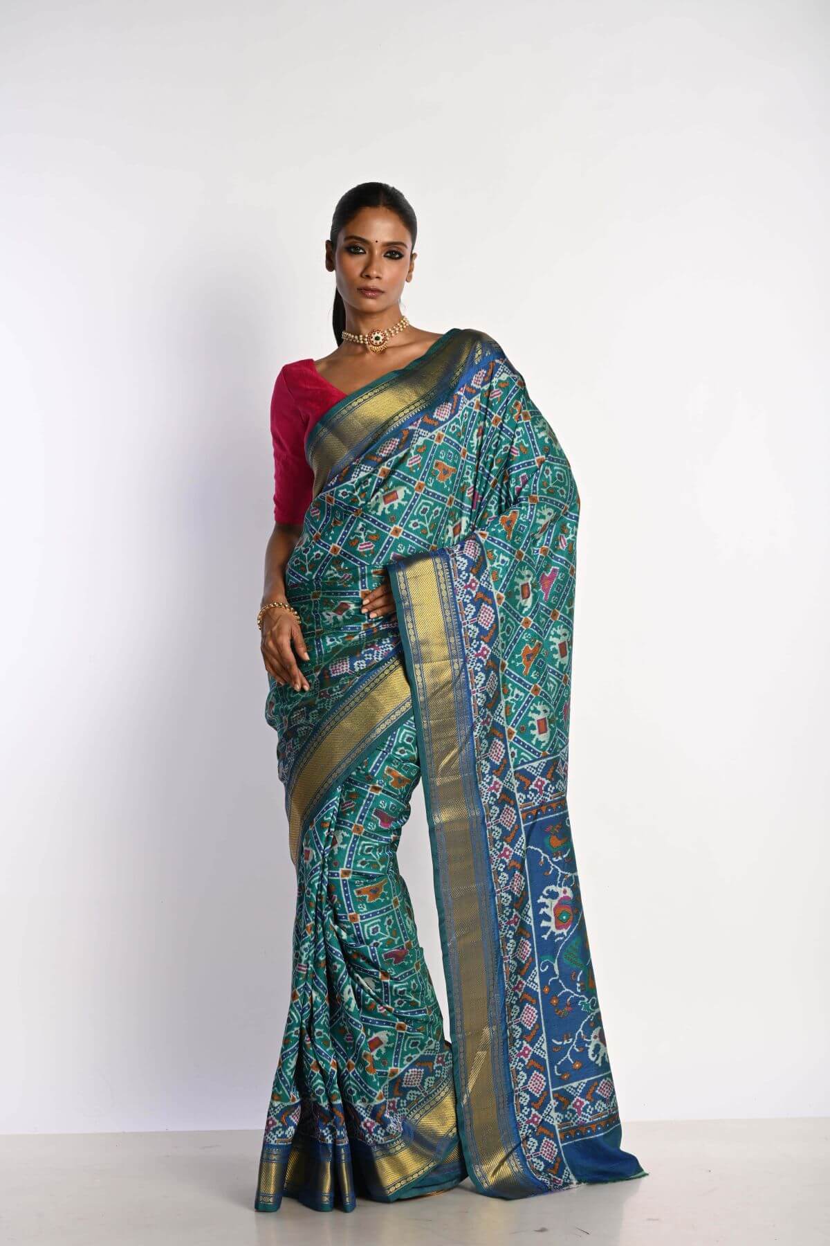 Blue Patola Silk Saree with Gold Zari Border - Anvi Couture