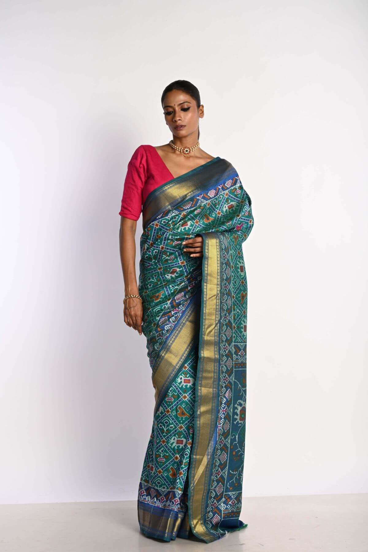 Blue Patola Silk Saree with Gold Zari Border - Anvi Couture