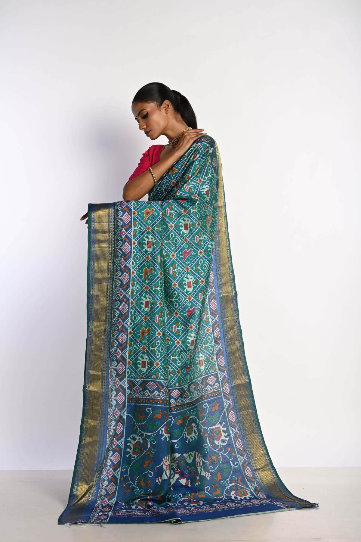 Blue Patola Silk Saree with Gold Zari Border - Anvi Couture