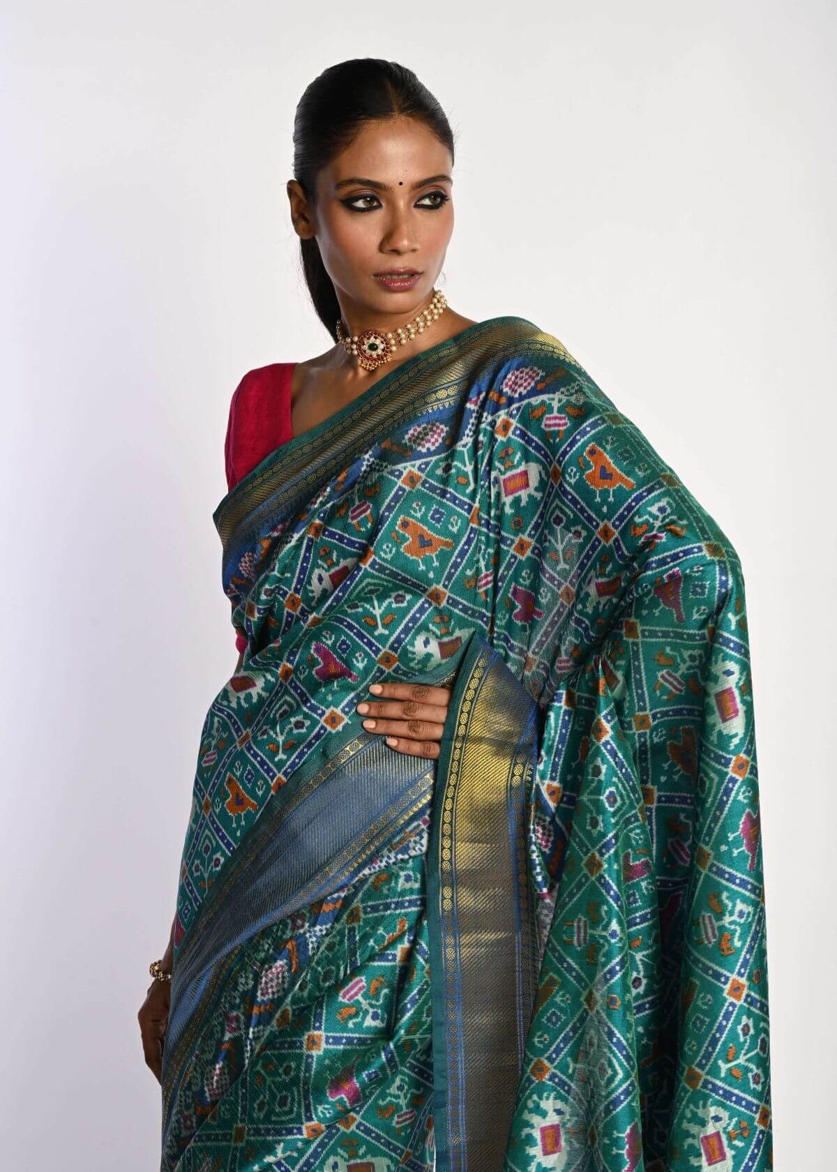 Blue Patola Silk Saree with Gold Zari Border - Anvi Couture