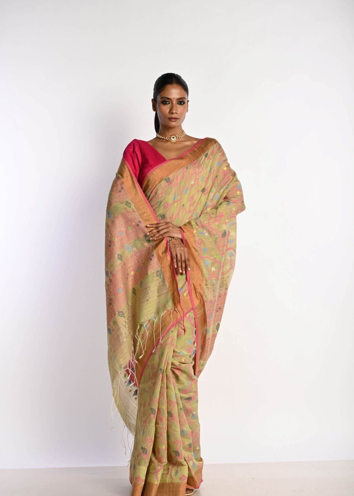 Pista Green Tant Jamdani Saree with All Over Floral Motifs - Anvi Couture