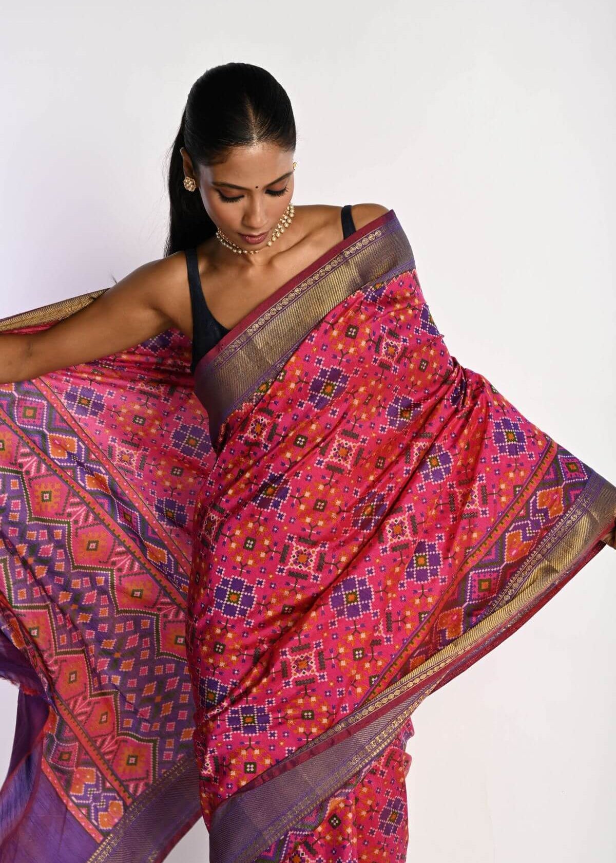 Pink Patola Silk Saree with Contrasting Purple Border - Anvi Couture