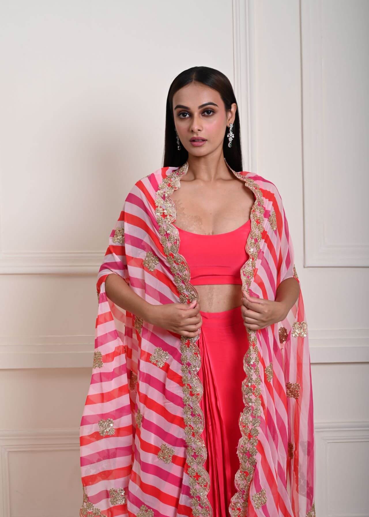 Stylish Rani Pink Drape Skirt and Cape Set with Intricate Zari Detailing | Party Wear