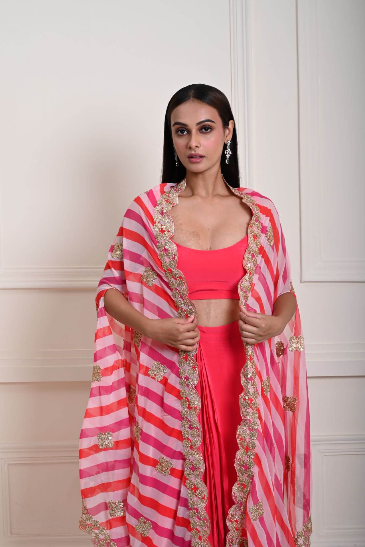 Stylish Rani Pink Drape Skirt and Cape Set with Intricate Zari Detailing | Party Wear