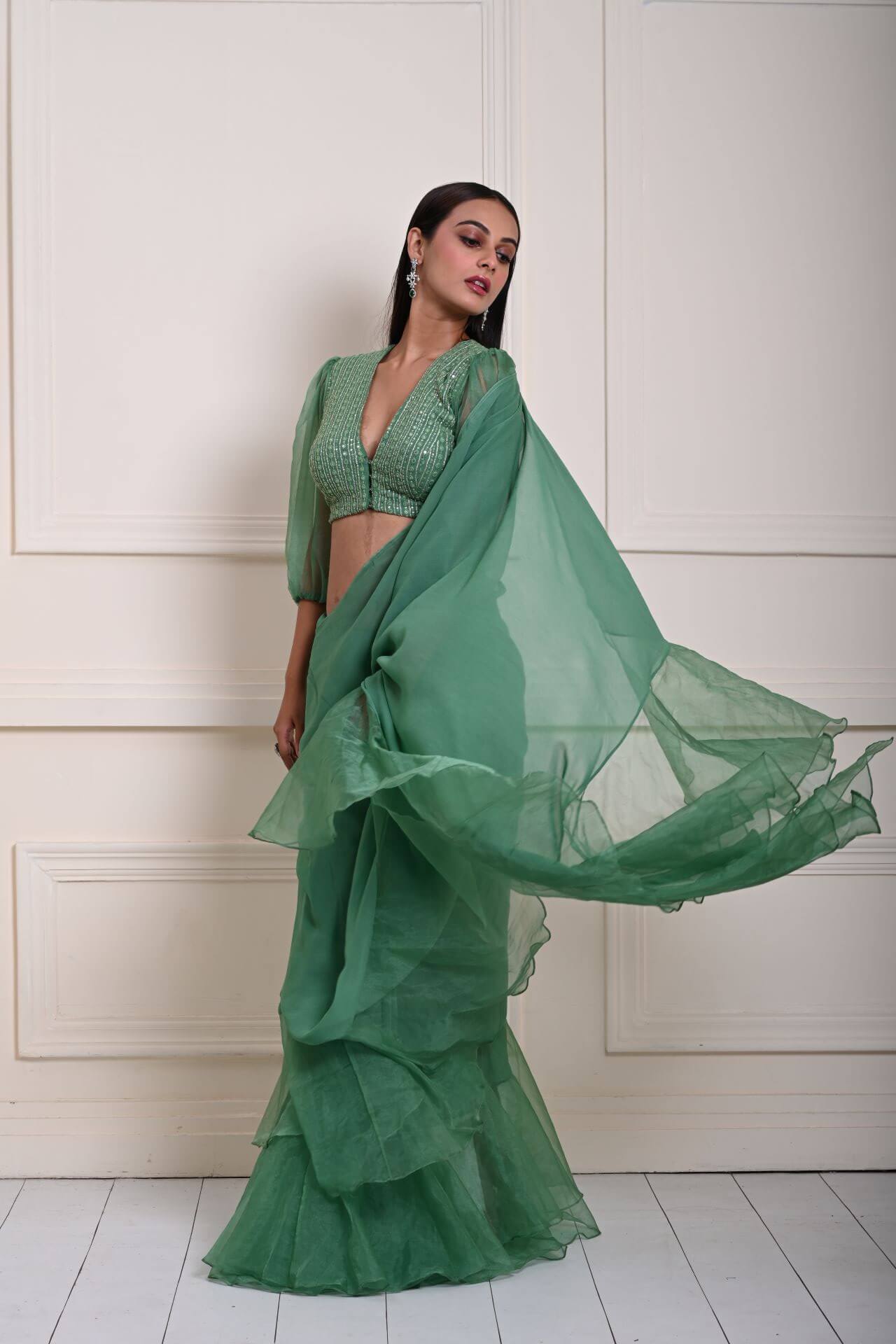 Elegant Ruffle Detailing on Sea Green Saree