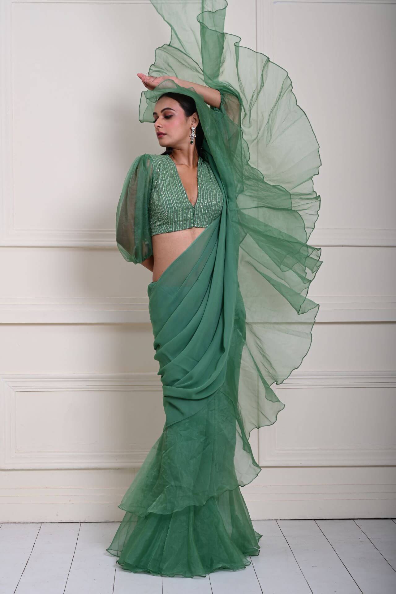 Elegant Ruffle Detailing on Sea Green Saree